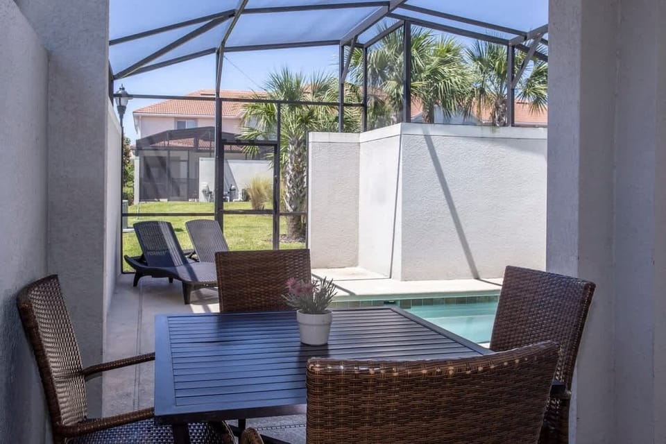 Screened in Pool with Patio Furniture 