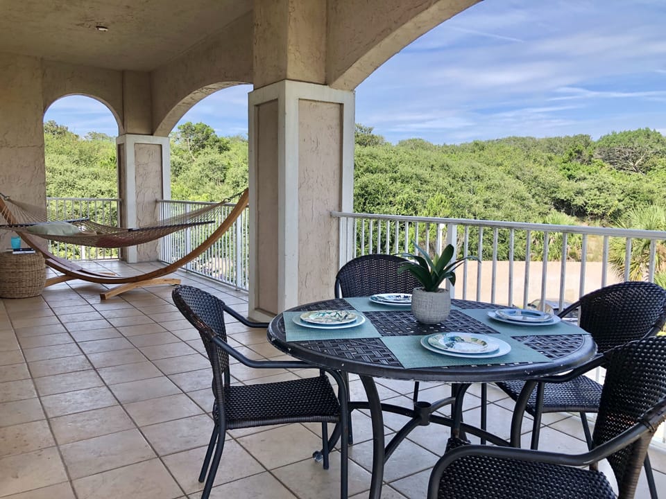 Large wrap around deck, perfect for dining al fresco, or a nap in the hammock.