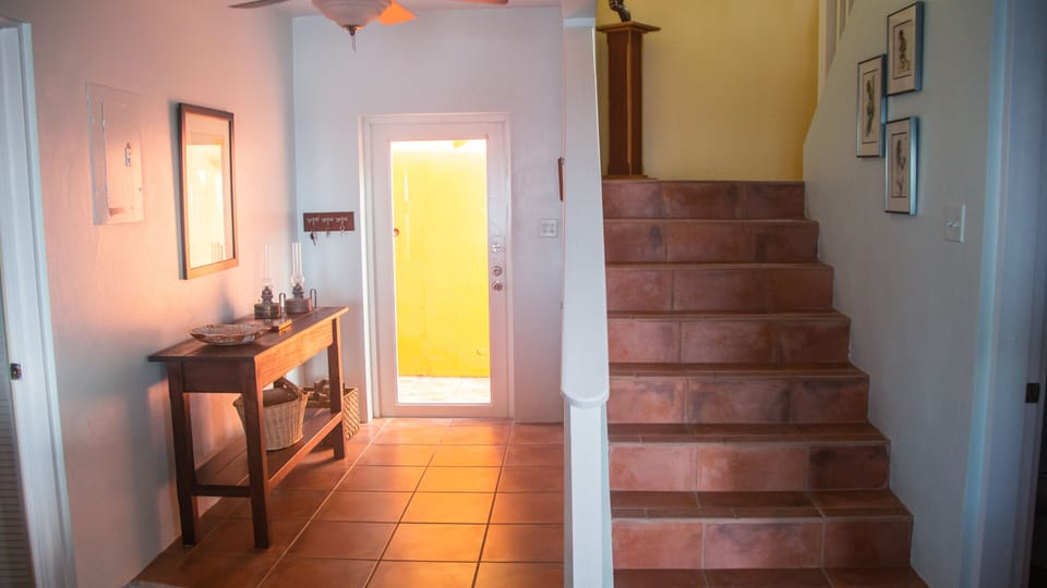 Entrance and stairway leading to 2nd floor bedrooms.