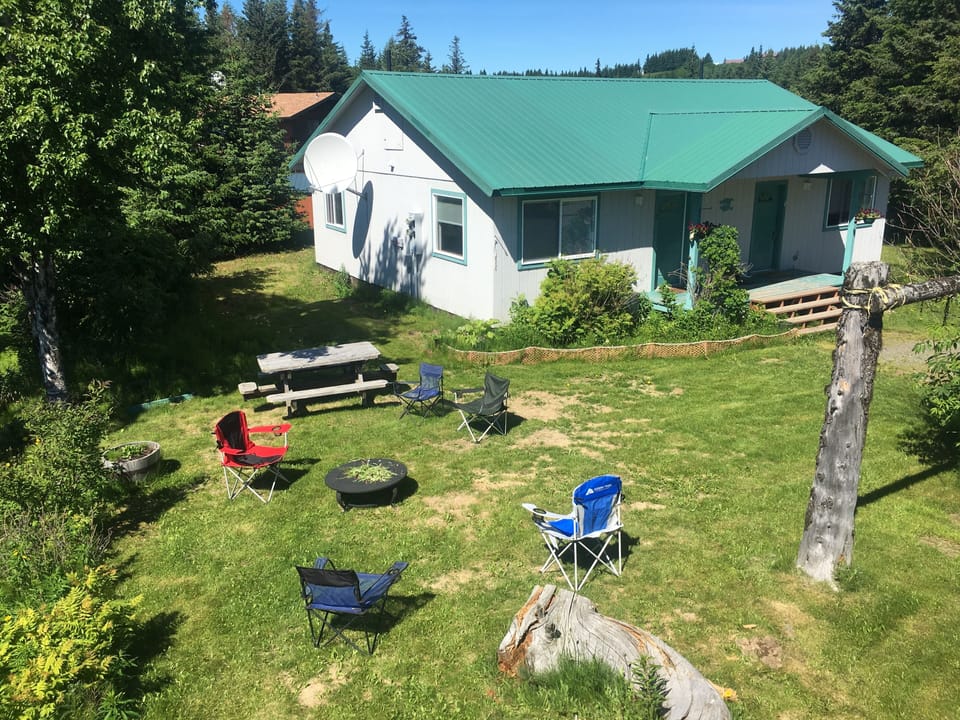 Outdoor fire pit and camp chairs