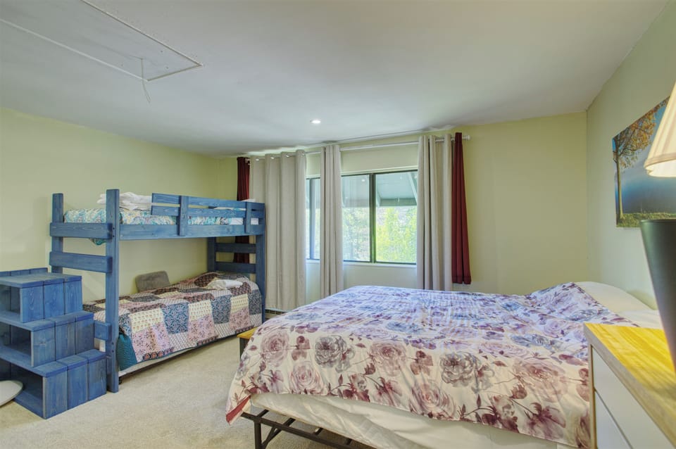 Second bedroom with Full bed and bunk beds