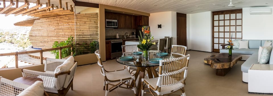 beautiful living and dining room space with full service kitchen