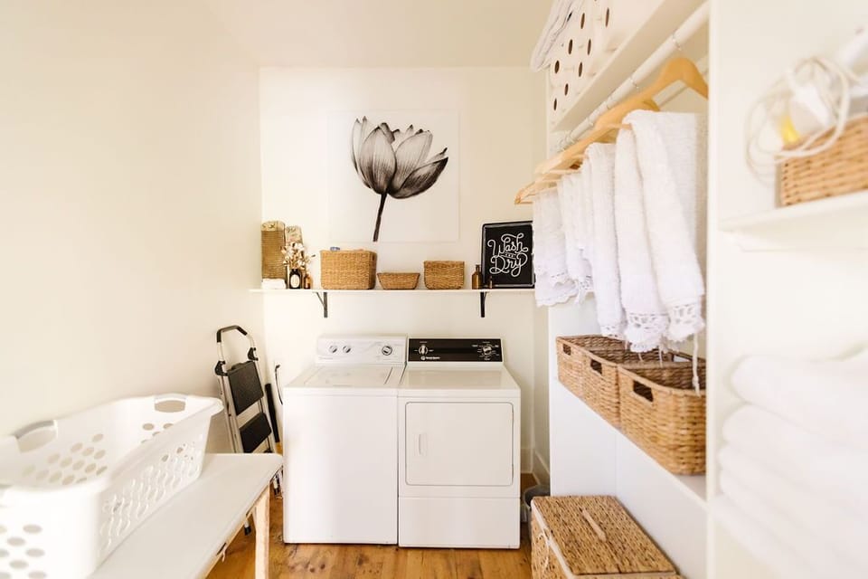 The laundry room is available for guests to use, also holds extra linens.