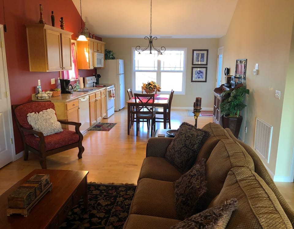 Entering the front door, you'll be greeted by a wide open floor plan & lake view