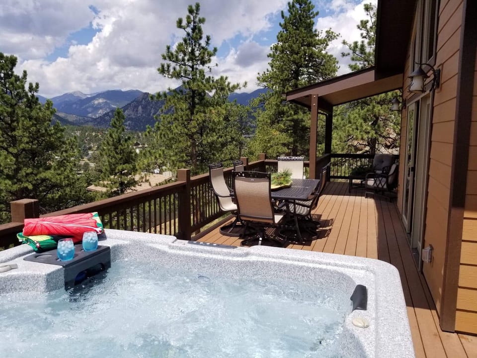 Large upper deck.  Brand new hot tub is now on patio.  Exact same great views 