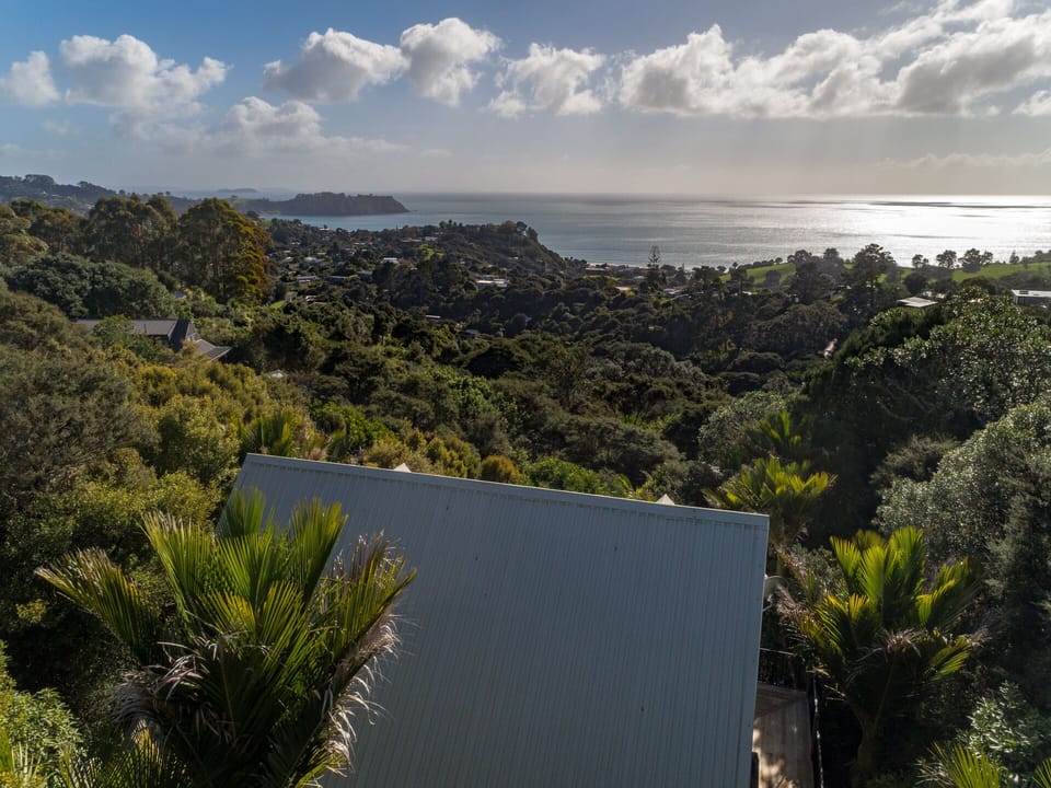 Private Bush setting complete with stunning northerly sea views