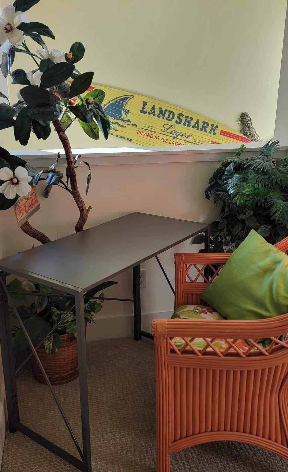 Desk in quiet spot for remote work, folds away easily making more sleeping area.