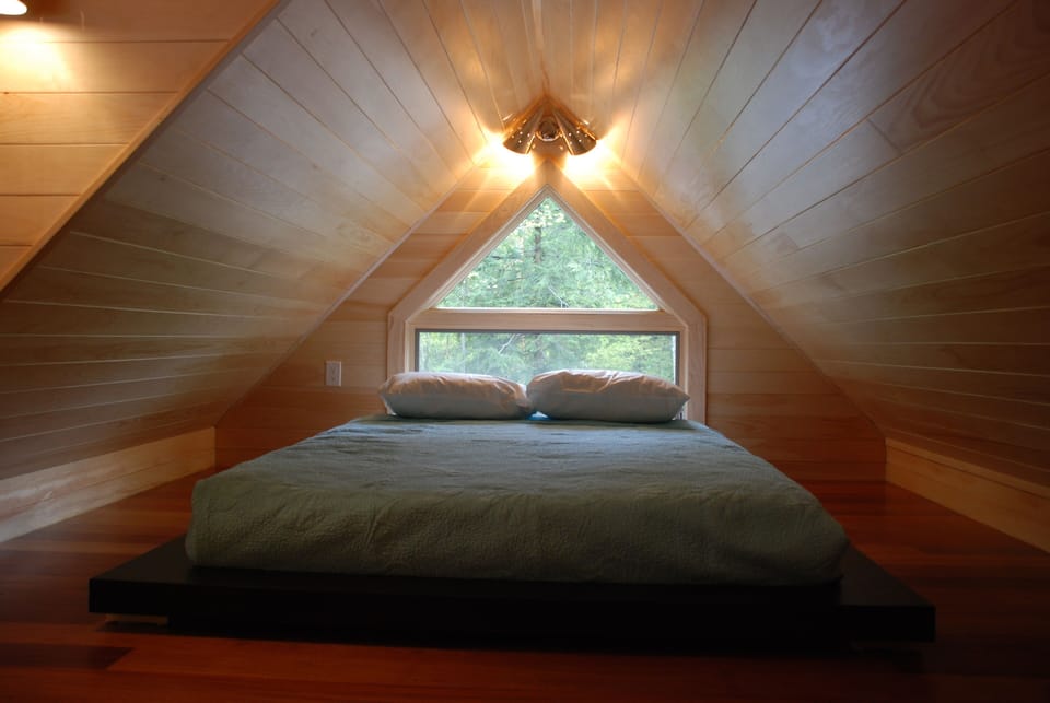 one of two loft bedrooms, each with queen bed
