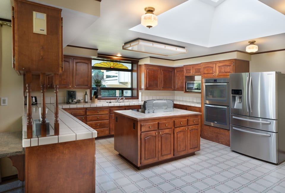 The kitchen is very well lit thanks to a large skylight.