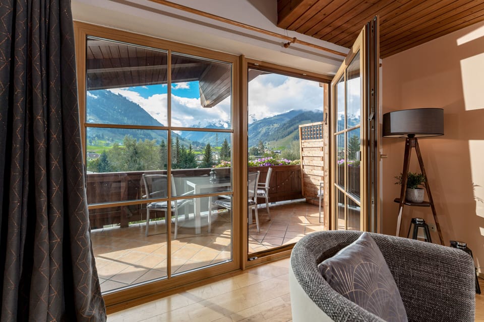 Entrance on to private balcony from living room, mountain views
