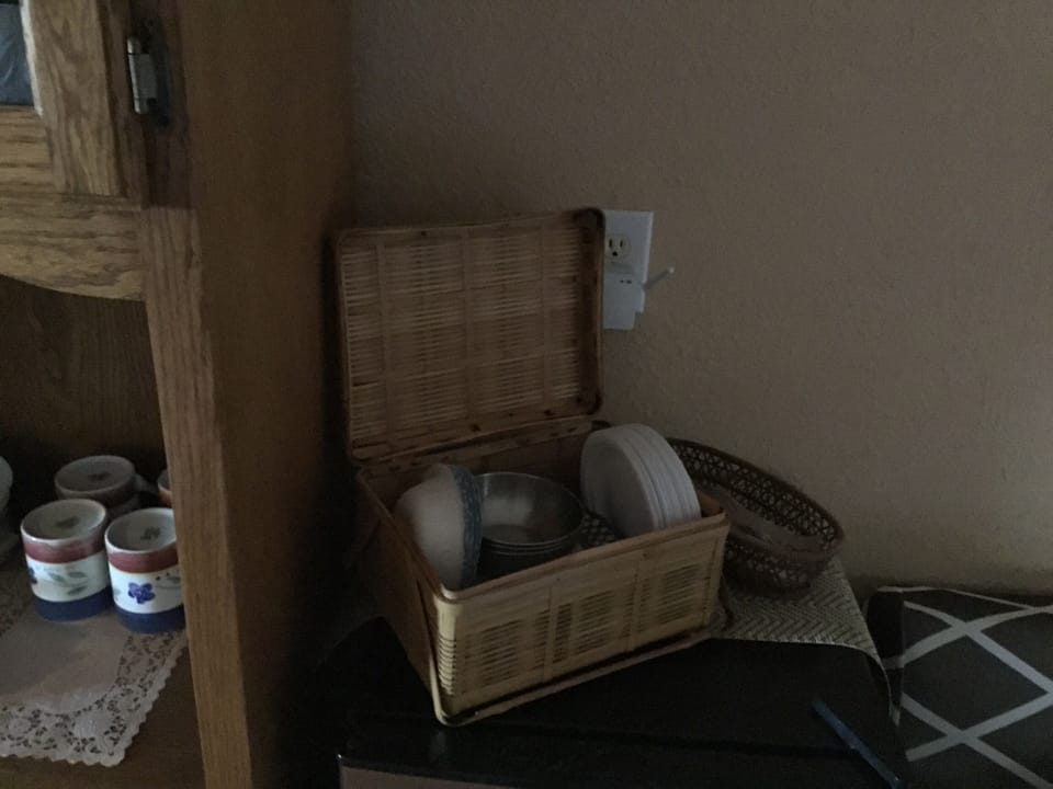 Picnic basket with plates paper bowls napkins etc.