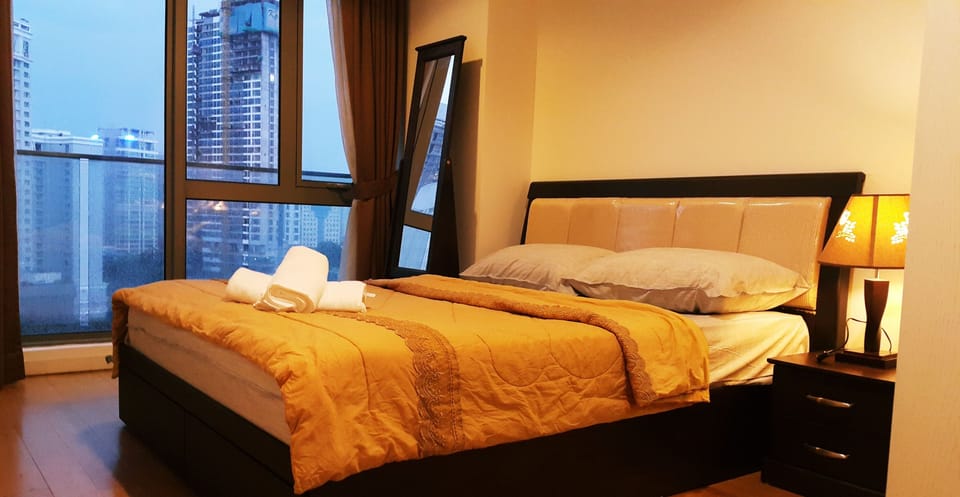 Comfortable City View Bedroom