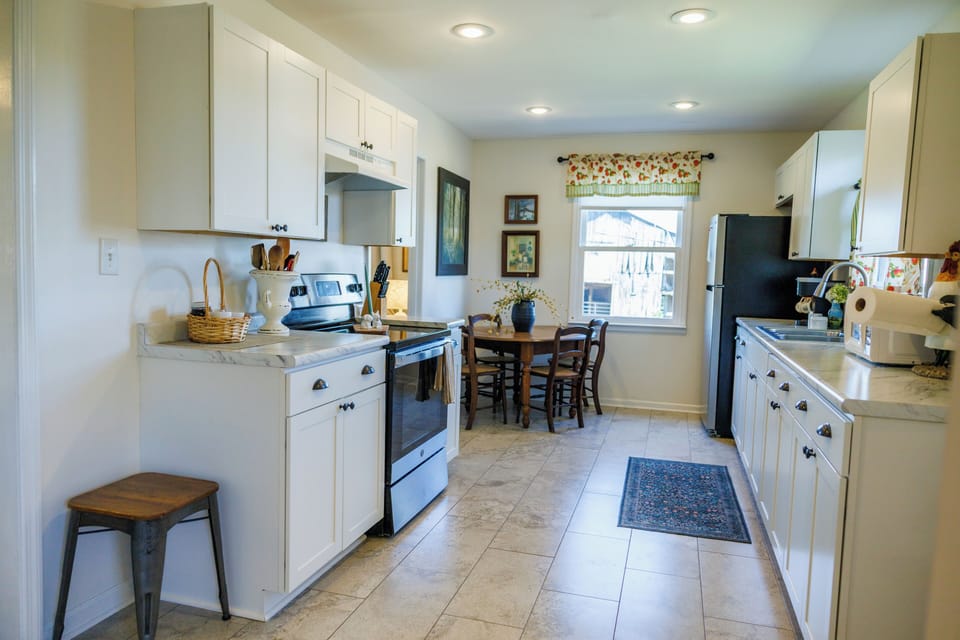 The cottage has a perfect kitchen for cooking dinner at the farm. 