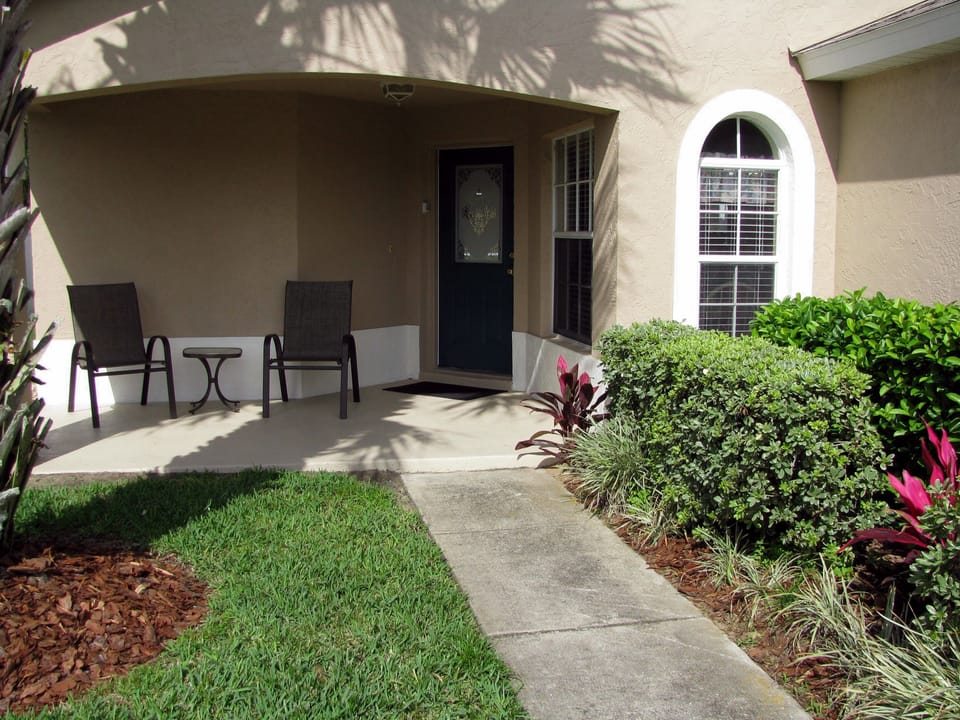 The Front Covered Porch gets the early Sun - A great spot for a morning coffee. 