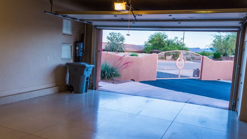 Clean 2 Car Attached Garage And Security Gate Exit From Small Entrada Community
