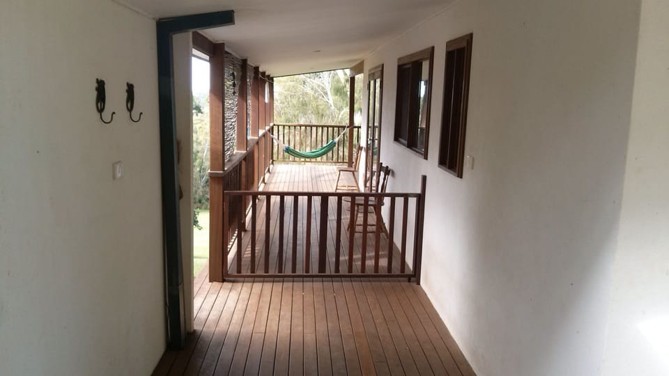 Walkway from parking area with gate for fully enclosed deck