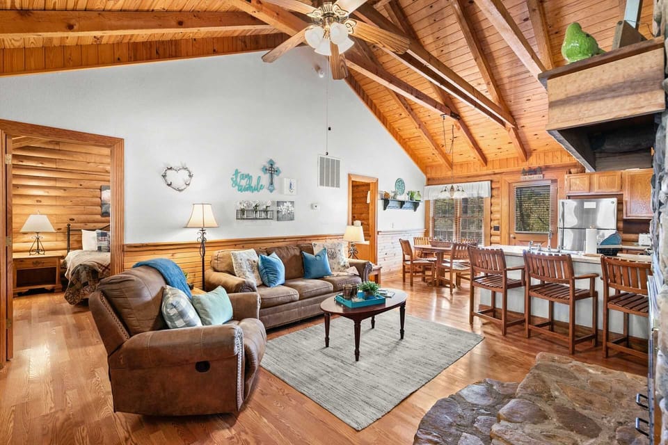 The spacious living area has seating for all and the couch doubles as a comfortable sleeper sofa.