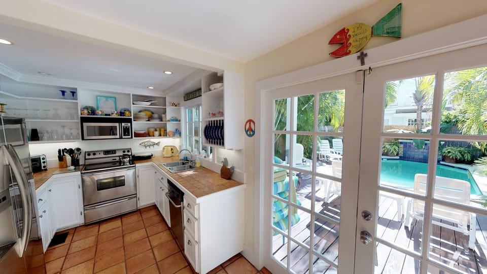 Kitchen and French doors to pool