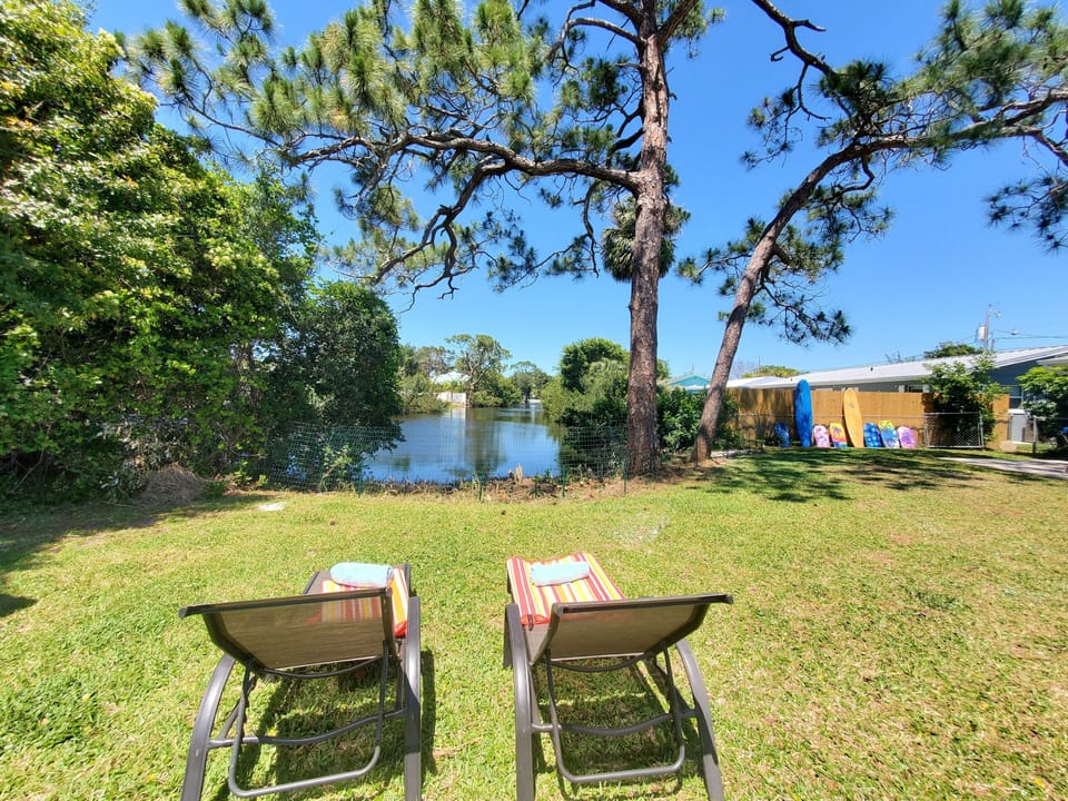 Back yard is fenced in., waterfront view. Walk to the beach or take a bike.