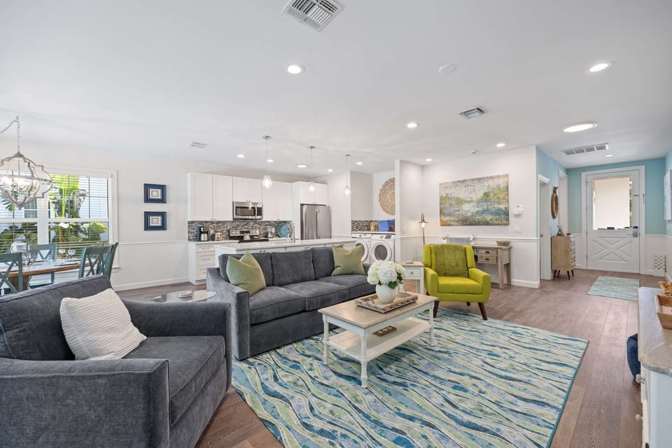 Spacious Living Room with Flat screen television, sofa, and chairs