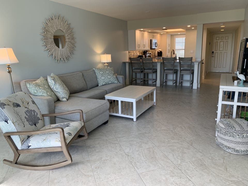 Open living with access to kitchen bar