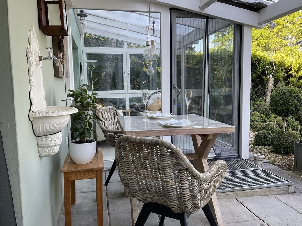 Covered Coffee Patio and Winter Garden