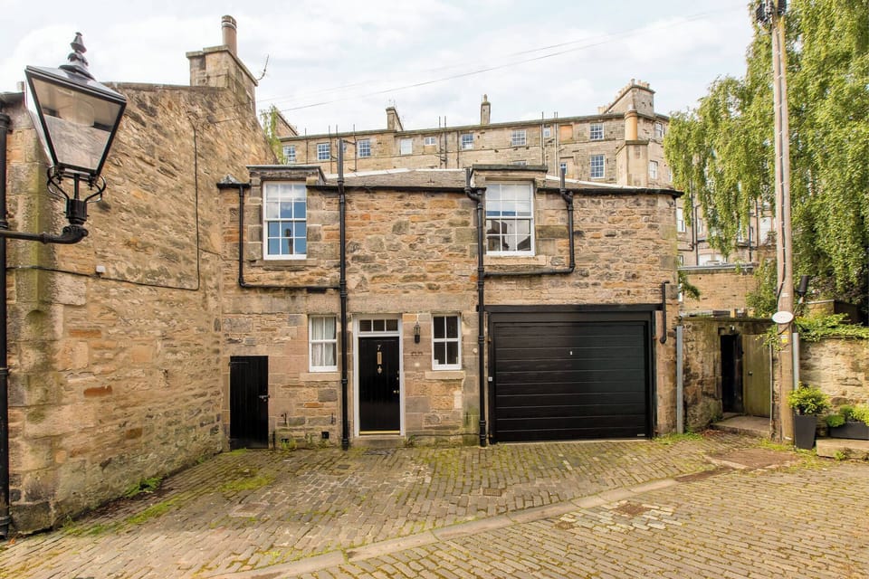 This mews property has it's own integral garage