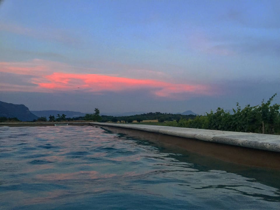 Enjoy the sun set with a nice glace of wine...