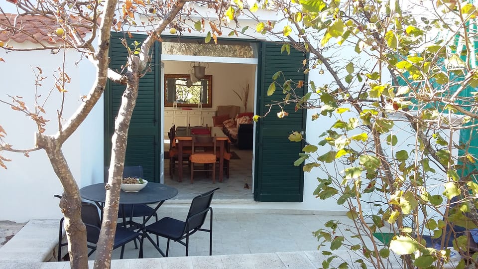 The terrace has direct access to the pool.
