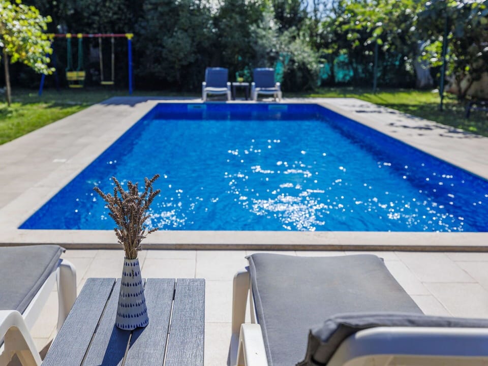 Water, Plant, Property, Furniture, Swimming Pool, Azure, Blue, Outdoor Furniture, Rectangle, Shade