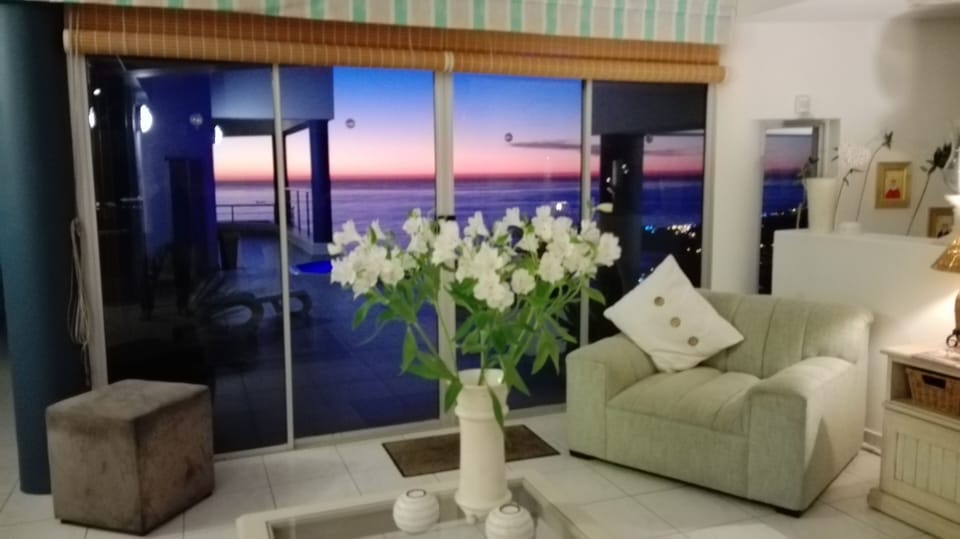 Living room and Jacuzzi patio at sunset!