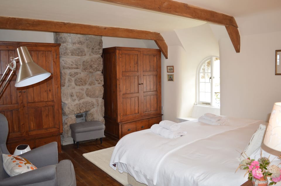 The main bedroom upstairs has plenty of cupboards