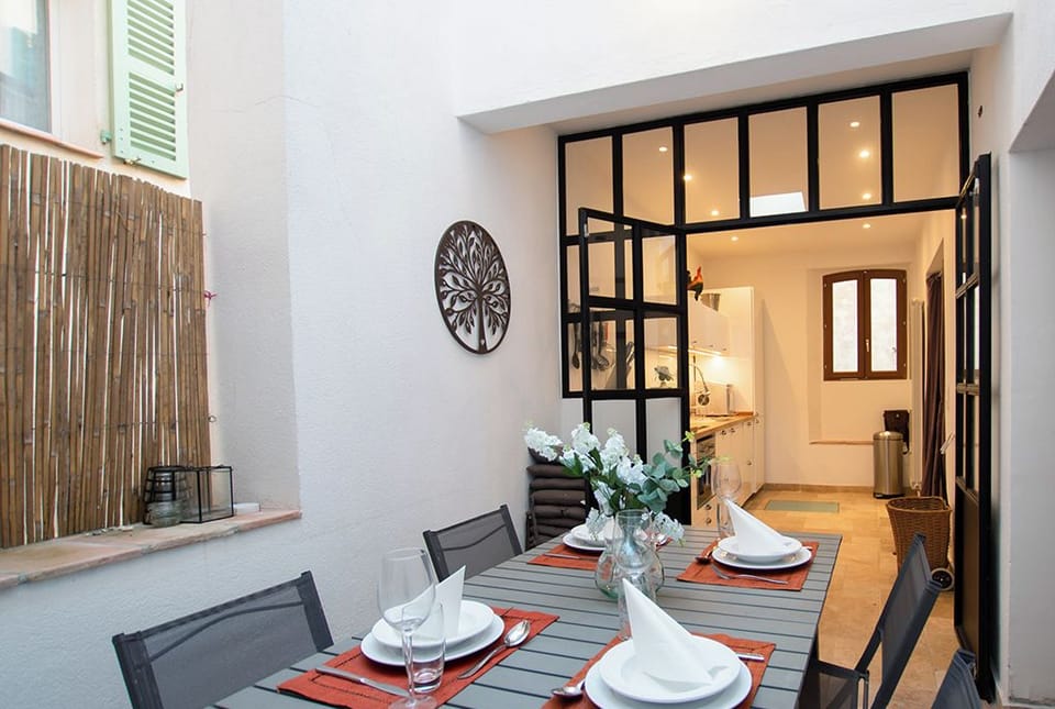 View of terrace dining area looking back into kitchen