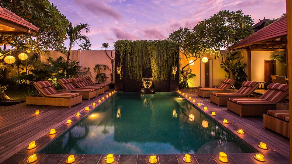 Private pool area with beautiful night lighting