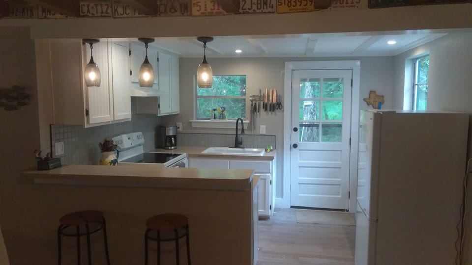 Pull up a seat at the bar in the new kitchen and enjoy the views!