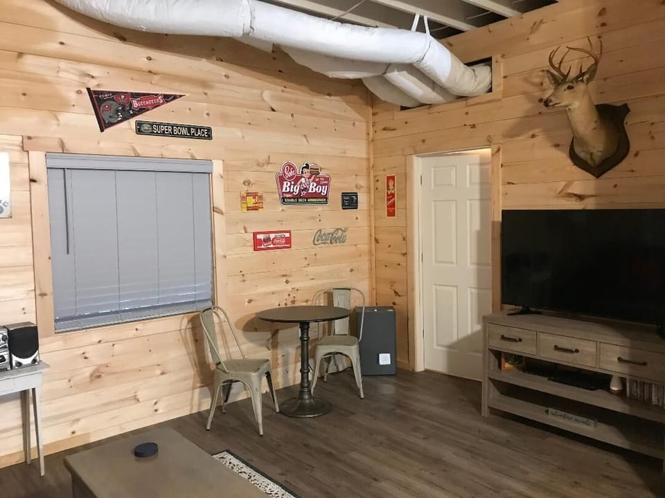 Game room with 60 " HDTV with PS 3.