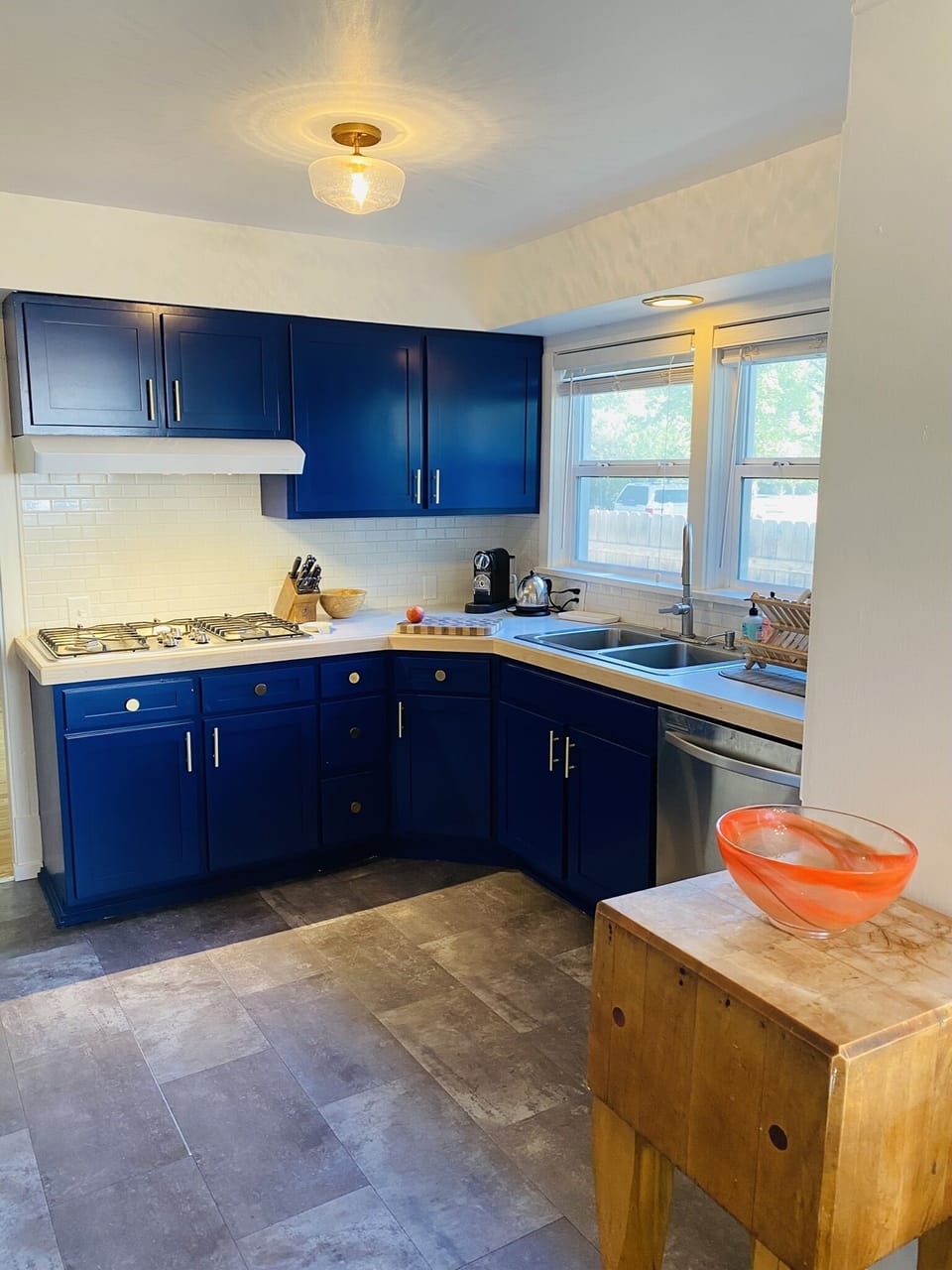 Beautifully redon cabinets with gas range, dishwasher and all you need to cook. 