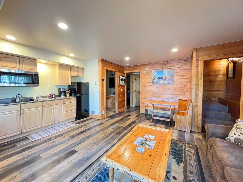 Spread out in the lower-level living area where extra dining seats and open space keep everyone comfortable.