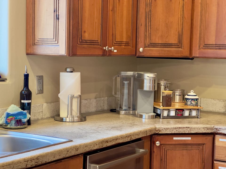 K cup (w/refillable pods), a Mr. Coffee type and a french press in cupboard!