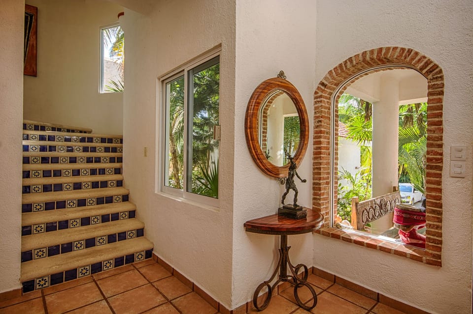 Head upstairs to the 2 master bedrooms and rooftop deck.