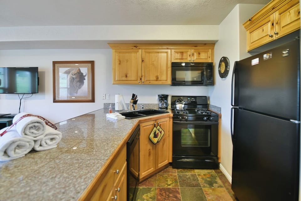 Kitchen with plenty of cookware