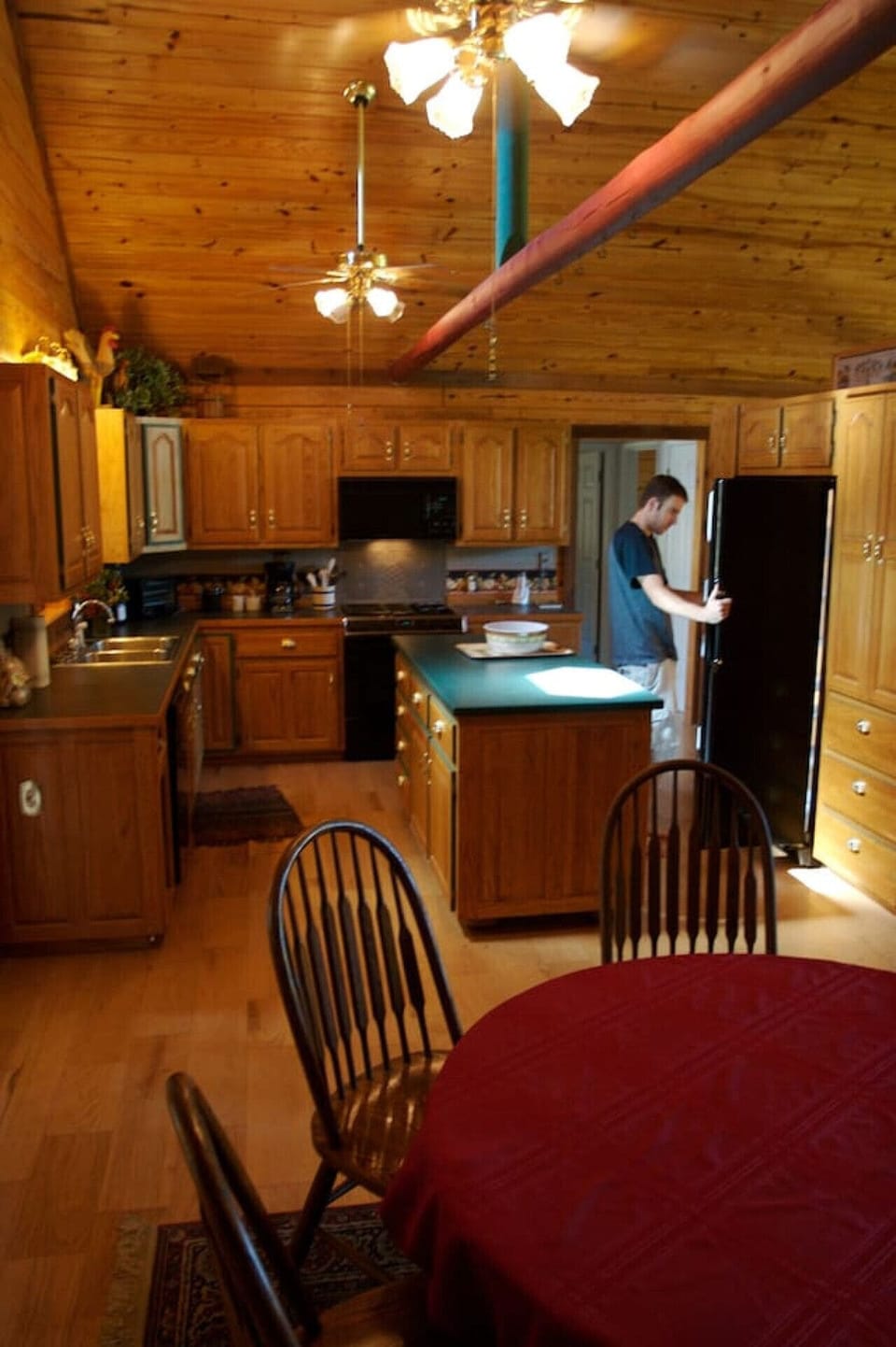 The well-equipped kitchen with granite island workspace and dining area.