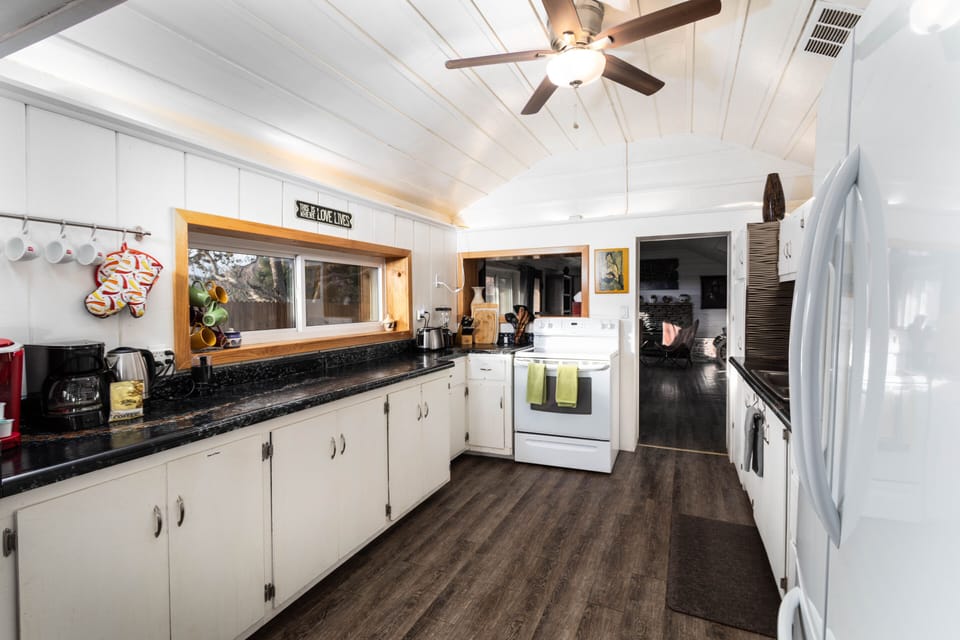 Kitchen w/Keurig, coffee maker, kettle, blender, toaster, microwave & crock pot 