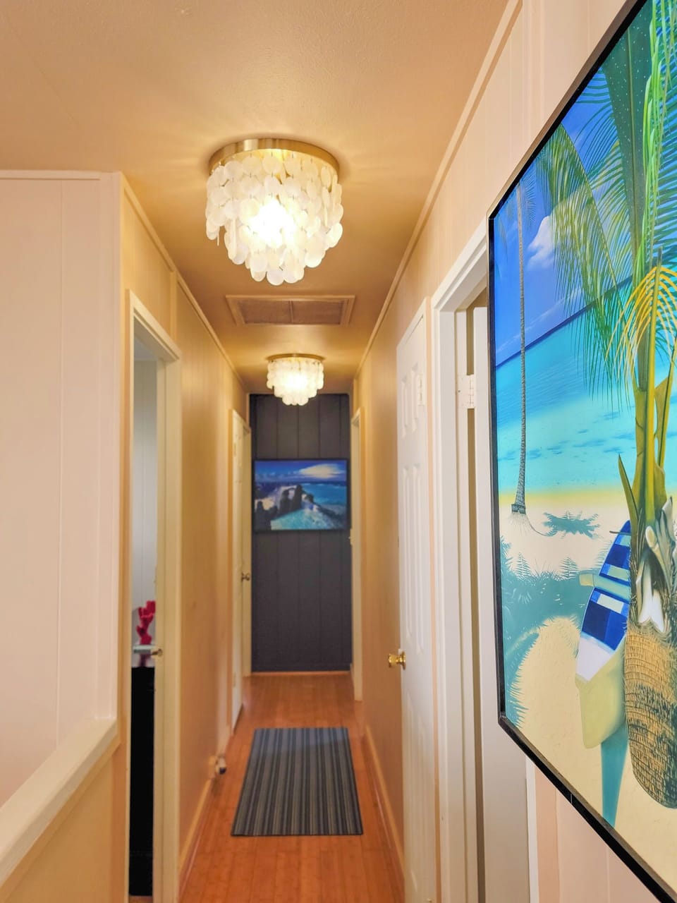 Upstairs hallway to 3 bedrooms
