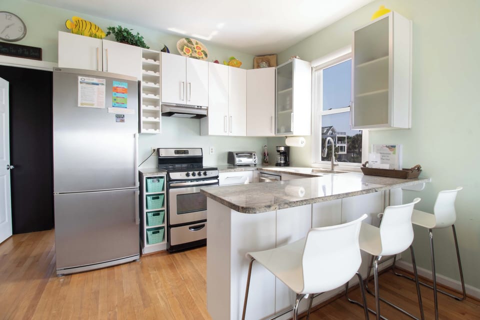 Your fully equipped kitchen invites you to cook up your favorite meals in style. Bright, clean, and thoughtfully stocked, this cheerful space makes prepping breakfast or whipping up dinner a breeze.