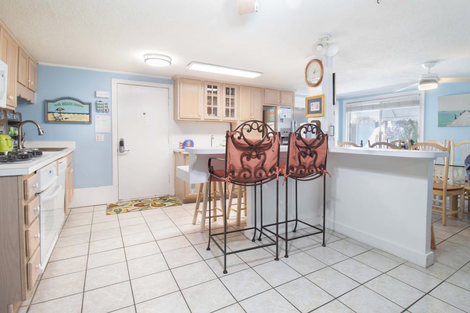 Your spacious kitchen flows into a bright dining area where you'll love gathering for meals and conversations.
