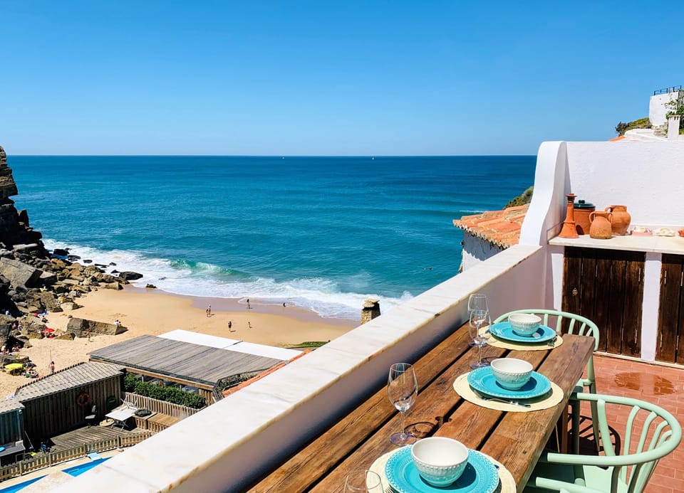 Go down the stairs and stick your toes in the Ocean