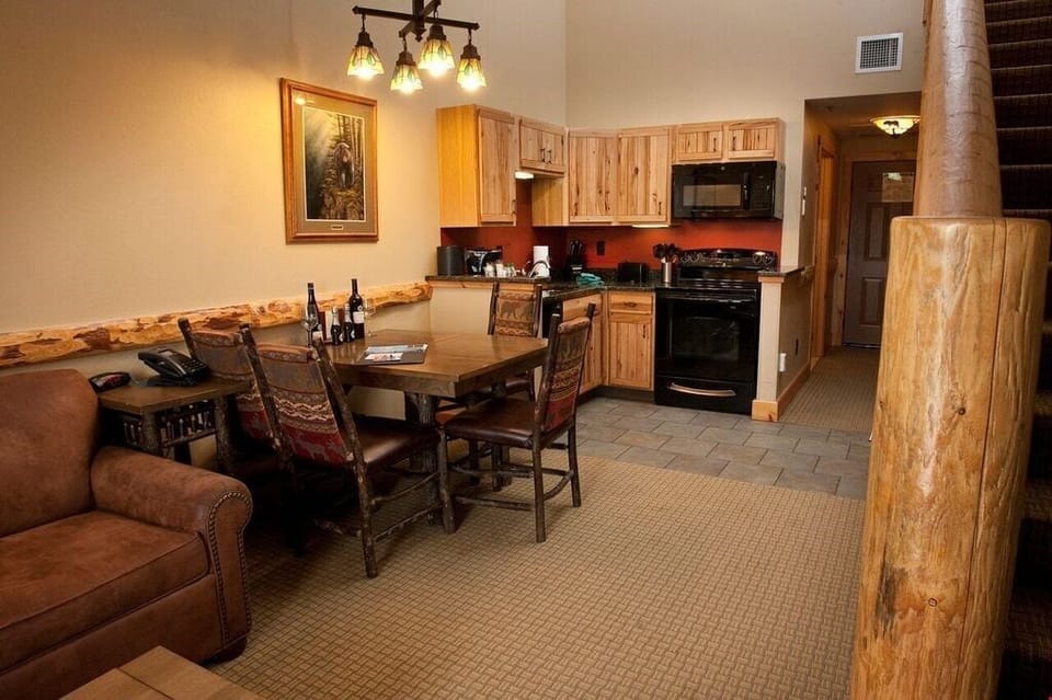 Relax in the gorgeous open-concept living space and enjoy a game of cards or meal at the dining table