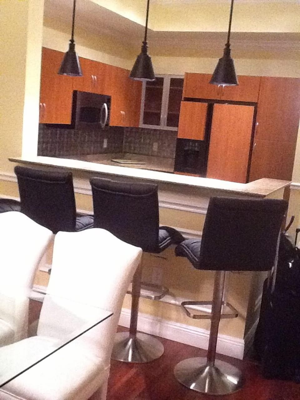 Adjustable height leather bar stools--so comfy for drinks or breakfast