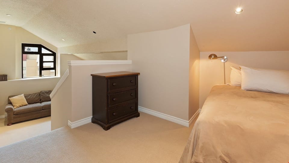 On the half floor between the main level and the loft there is a bunk bed perfect for the kids!